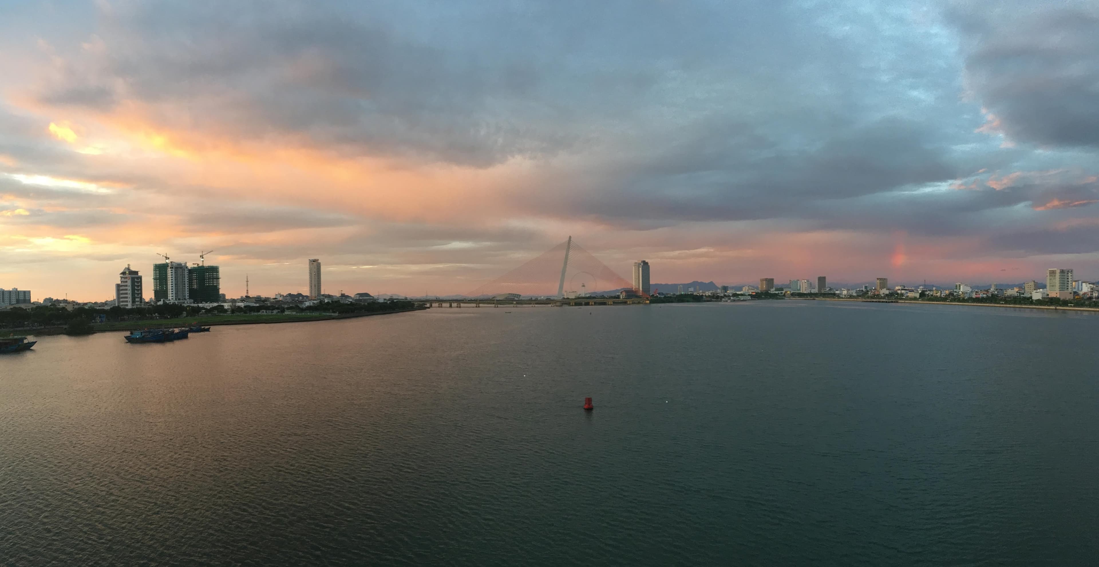 The Han River and Da Nang bridges glowing at sunrise