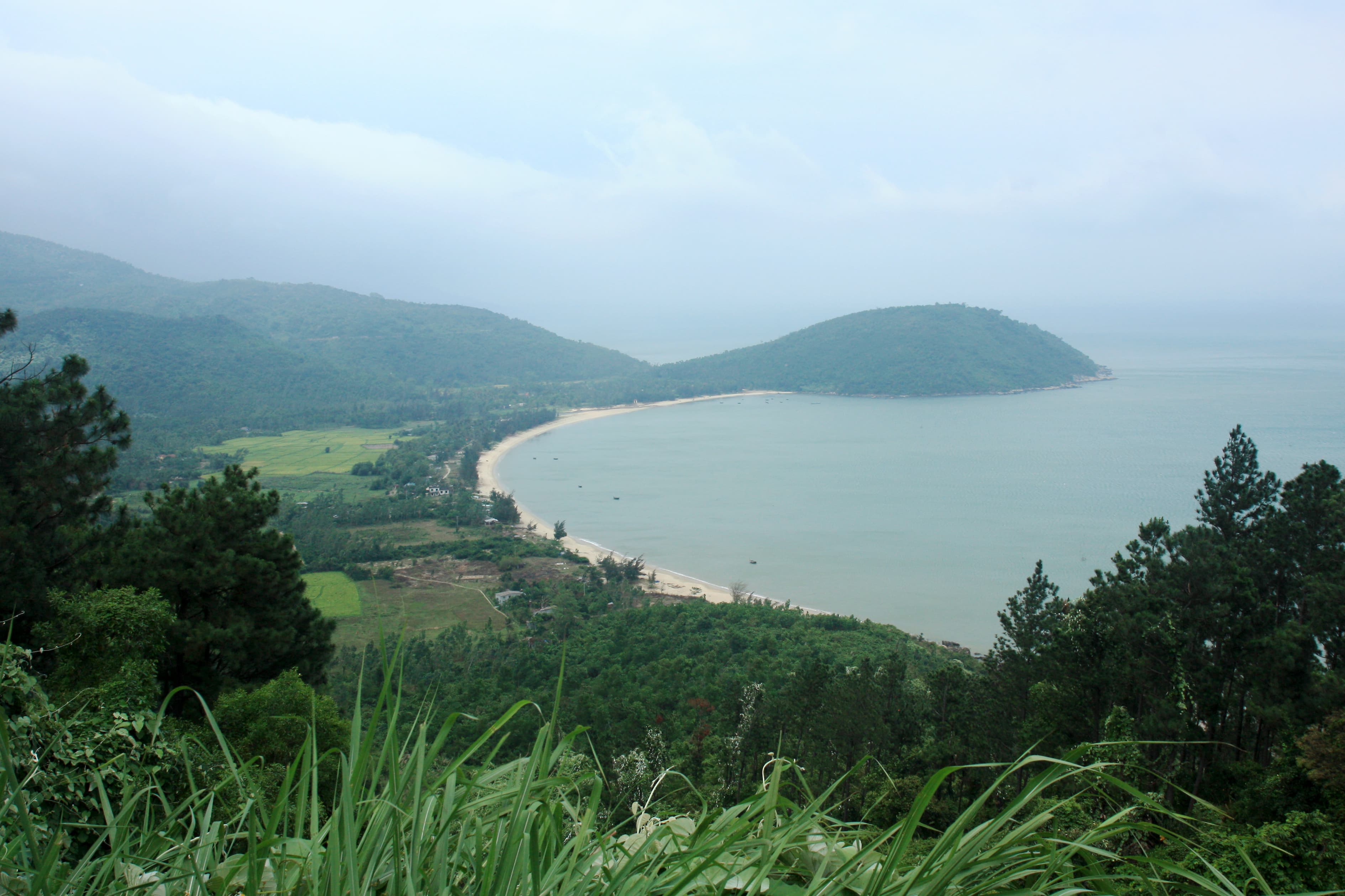 The sweeping coastal view of the bay and mountains from the Hai Van Pass between Da Nang and Hue
