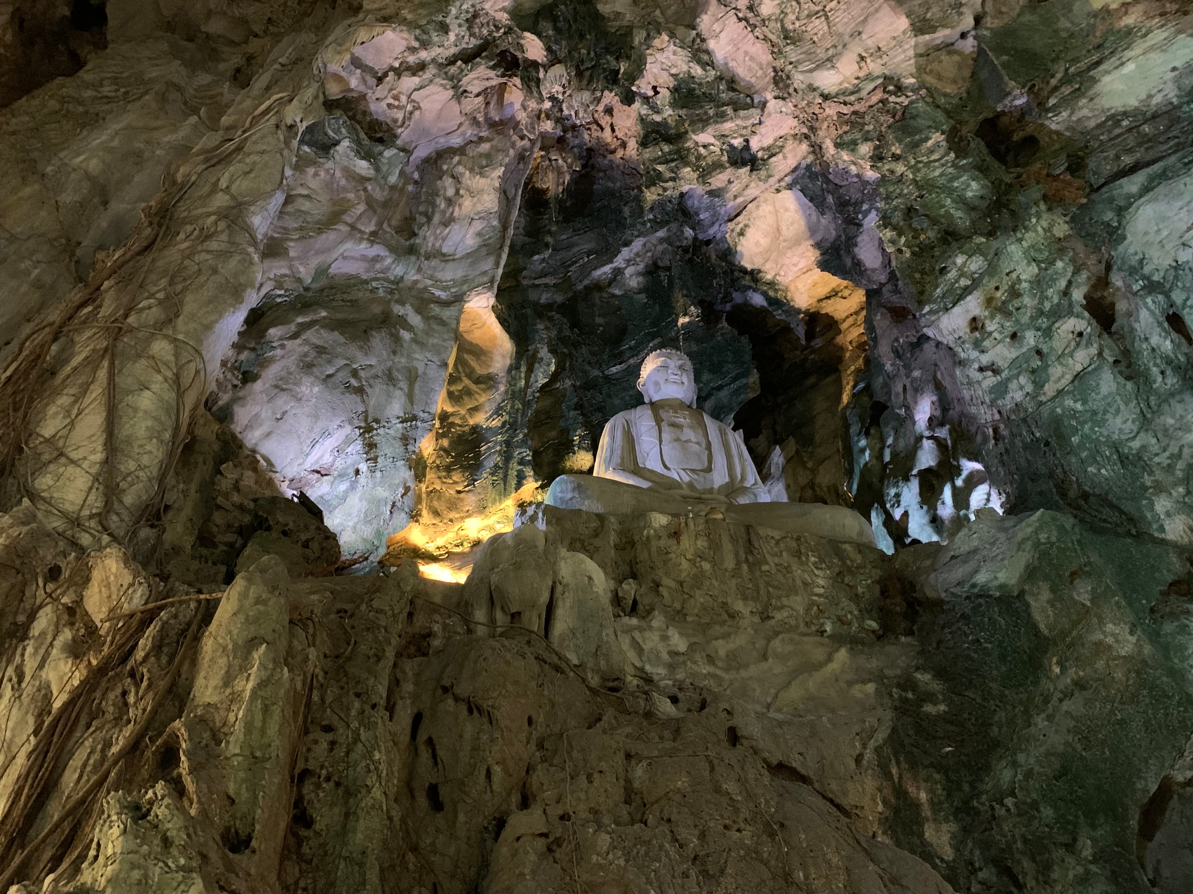 Inside Huyen Khong cave at the Marble Mountains, the largest cavern on Thuy Son, lit from openings in the roof